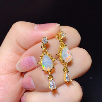Pure natural dazzling white opal earrings, with a main stone size of 6 * 8mm0811140512